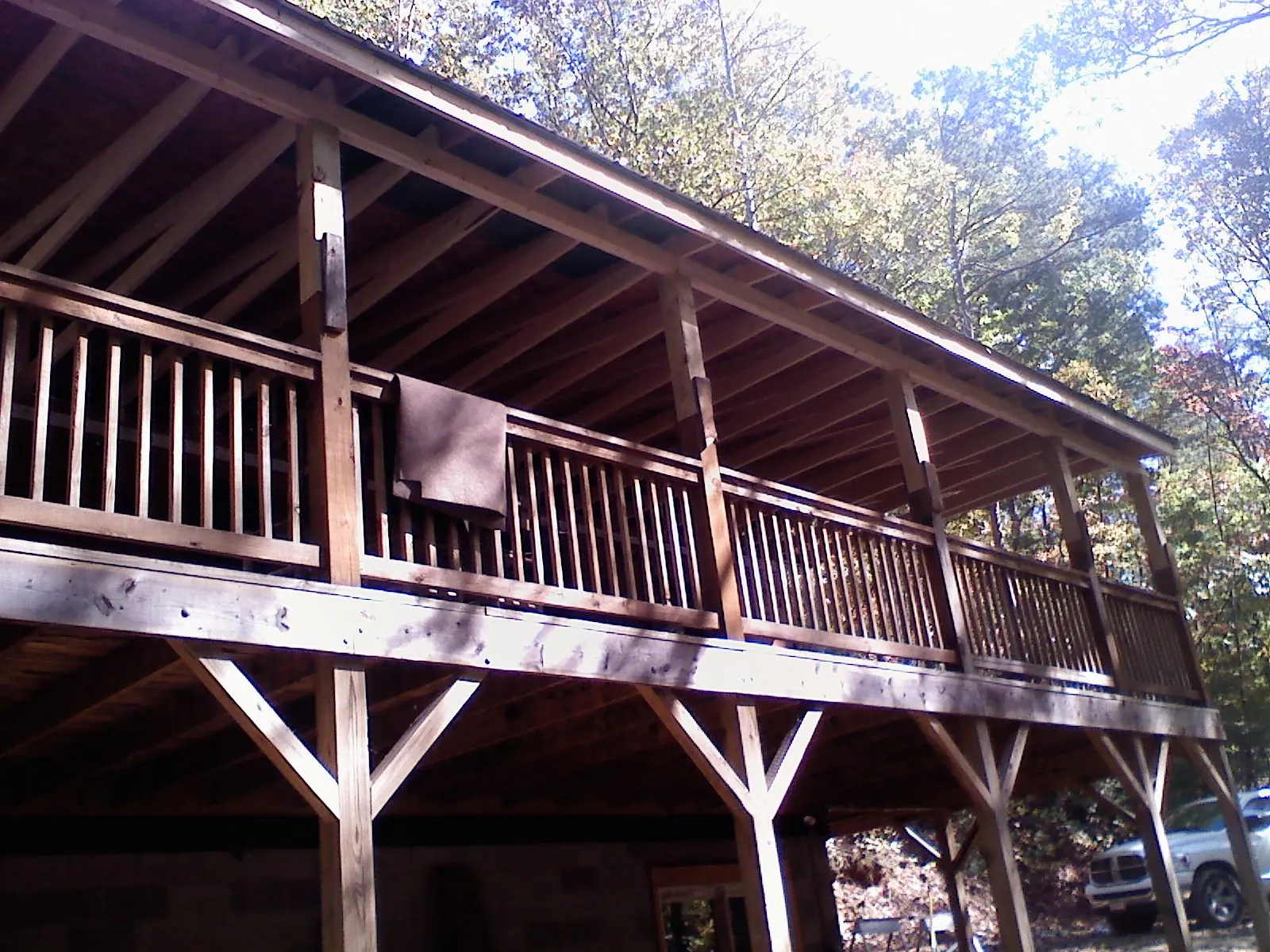 Timber framing under a new elevated porch and deck — Roof Leak Repair in Macks Inn by Roofing Brothers